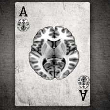 Black and white picture of a playing card with a picture of brain on the card.