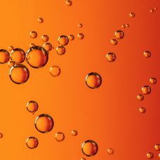 Bubbles on orange and red background.