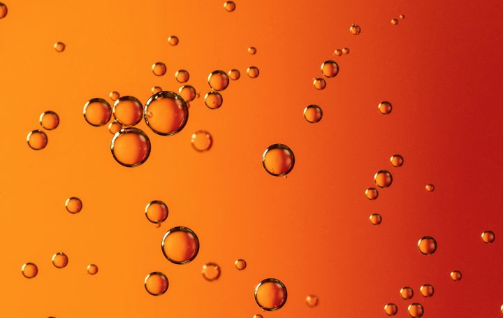 Bubbles on orange and red background.