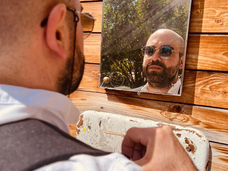 Davit in front of a mirror