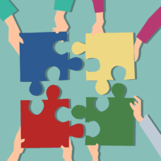 Ihmiset ojentavat palapelin palaset keskelle, jolloin ne sopivat yhteen.