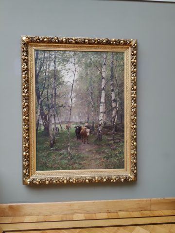 Maalaus Turun taidemuseosta. Maalauksessa lehmiä metsässä.