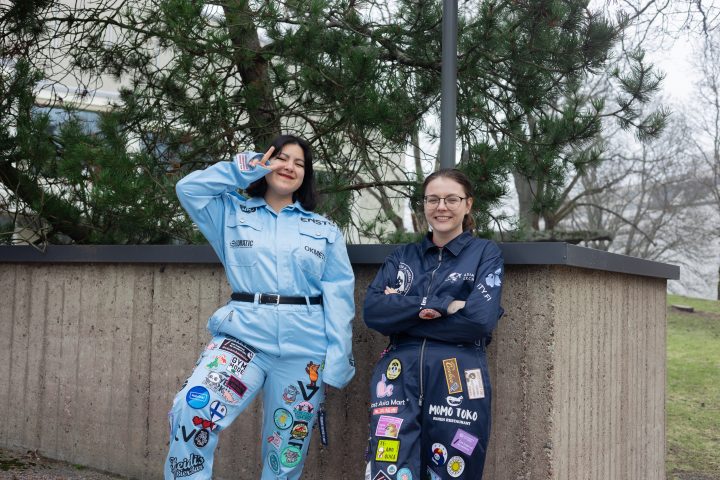 Two students in blue overalls