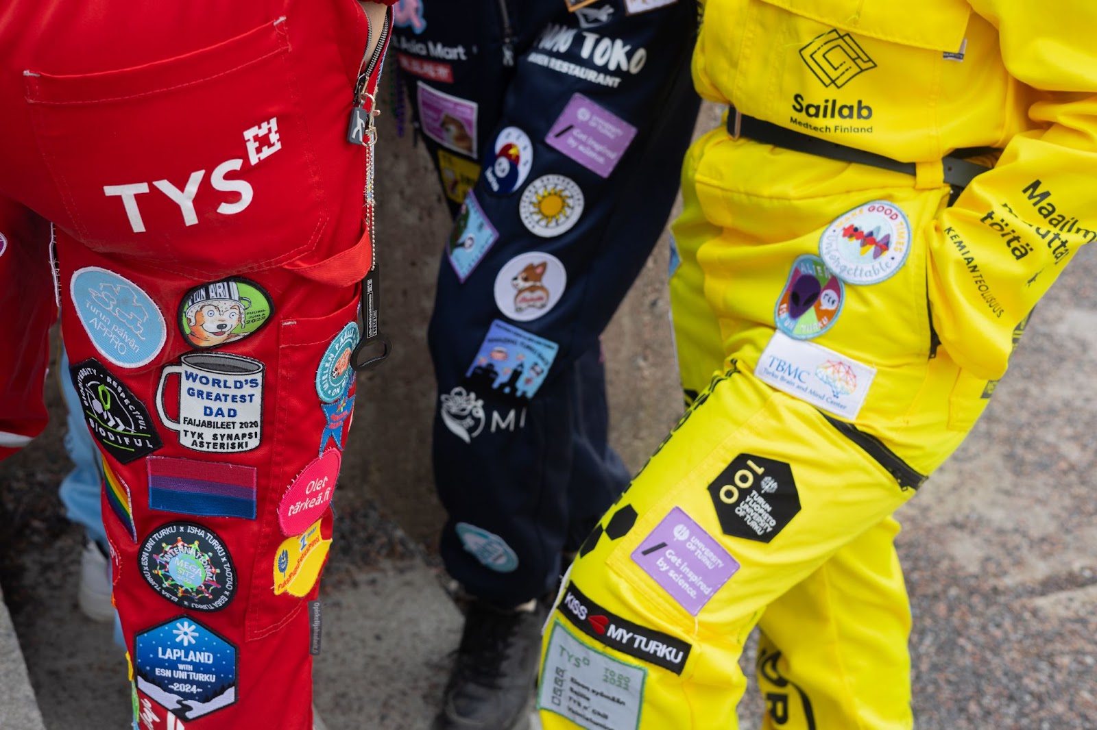 Close up of patches on student overalls